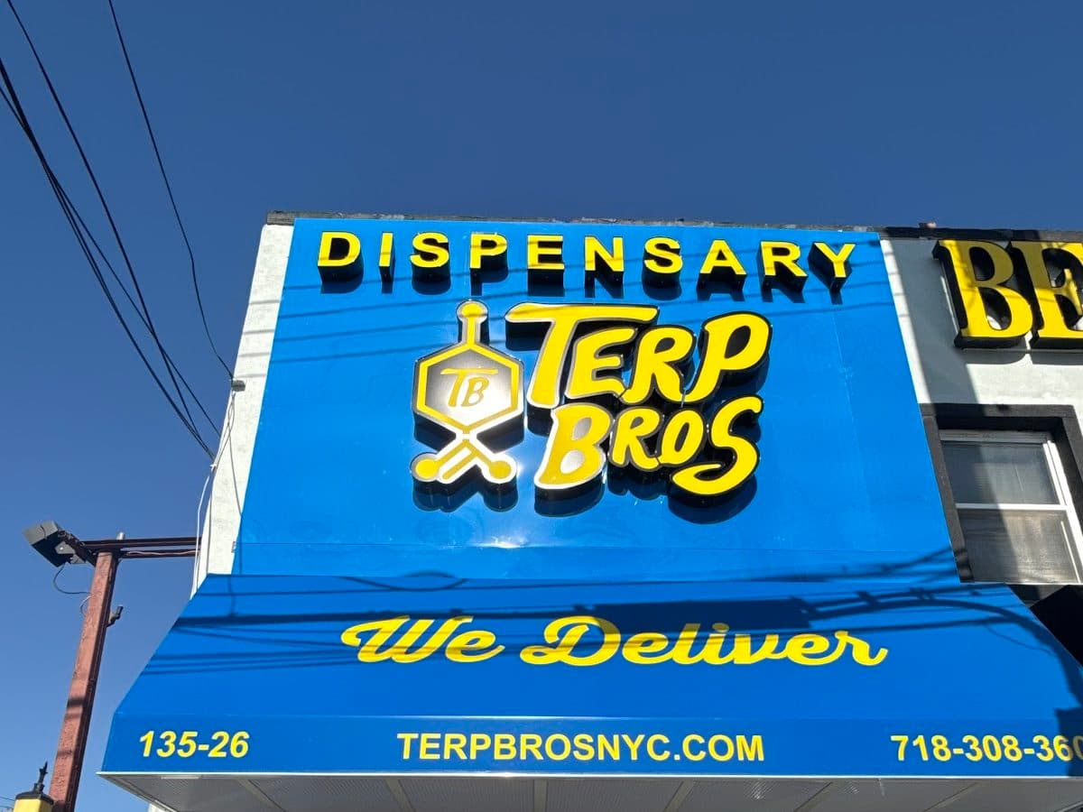 Terp Bros Ozone Park storefront at 135-26 Cross Bay Blvd: the Terp Bros Dispensary sign over a blue awning that reads We Deliver